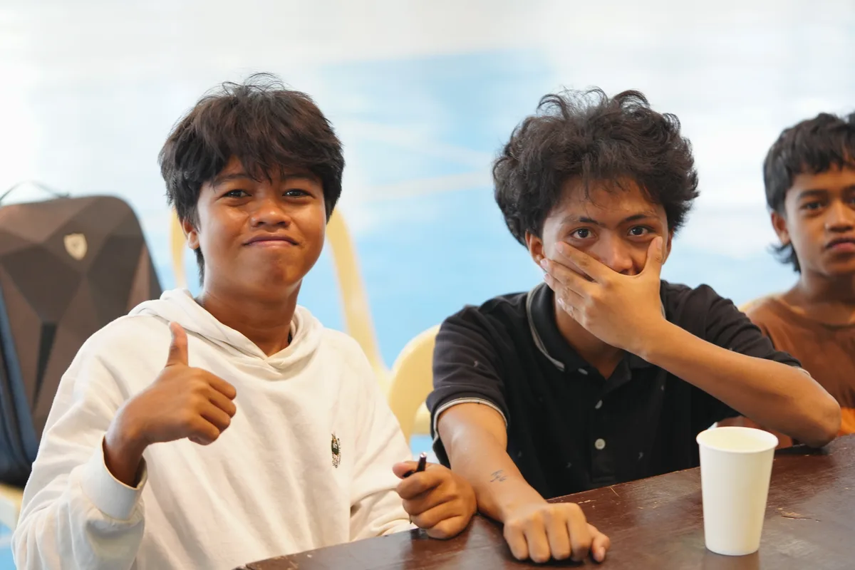 Community members receiving care packages during Bless the Community program