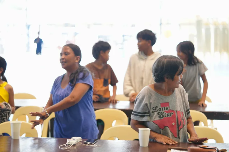 Community feeding program with care package distribution