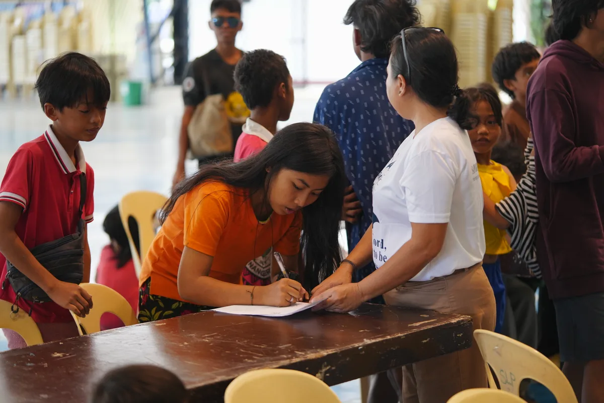 Registration table for community members at the food distribution