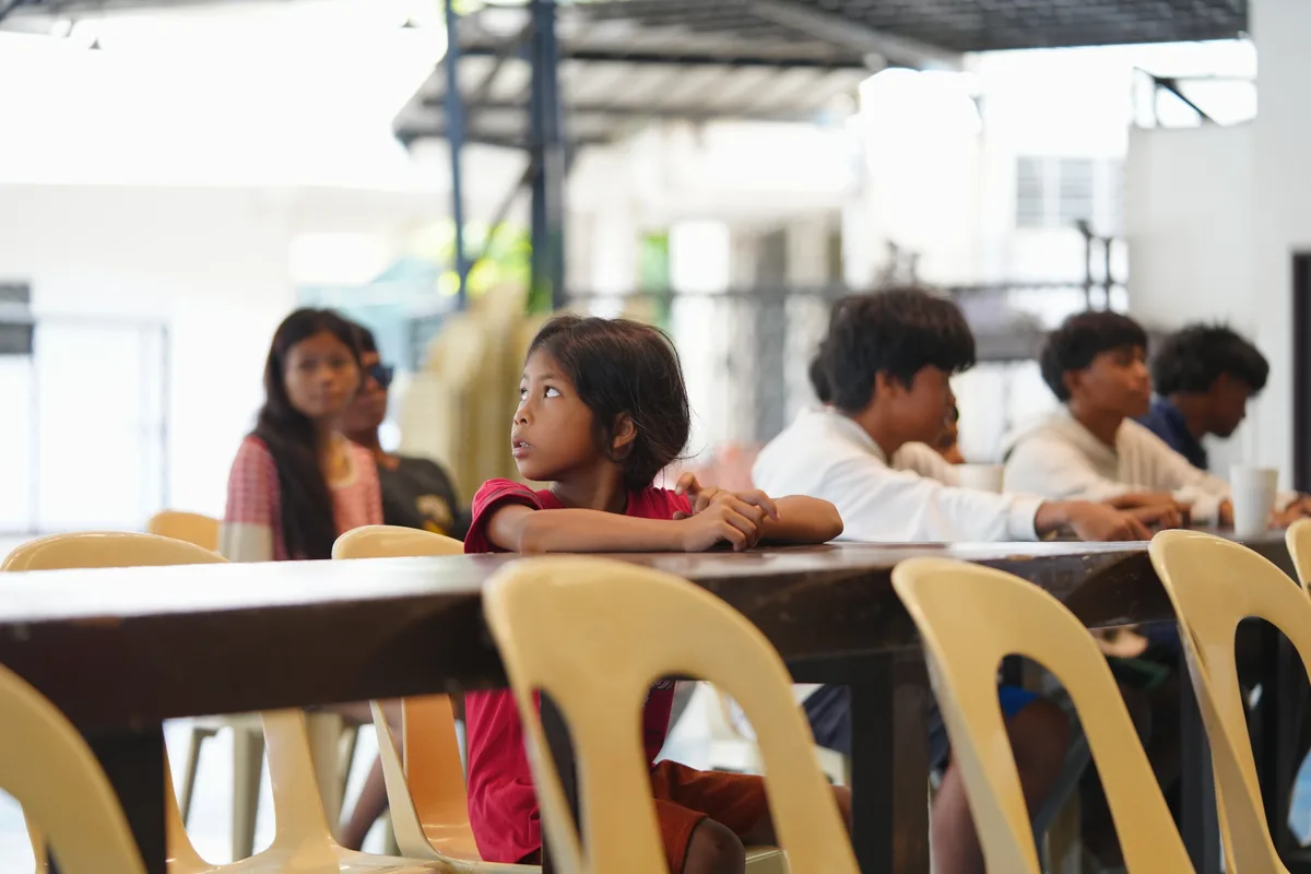 Community members enjoying a meal together
